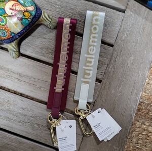 Two Lululemon Athletica Neverlost Key Chains